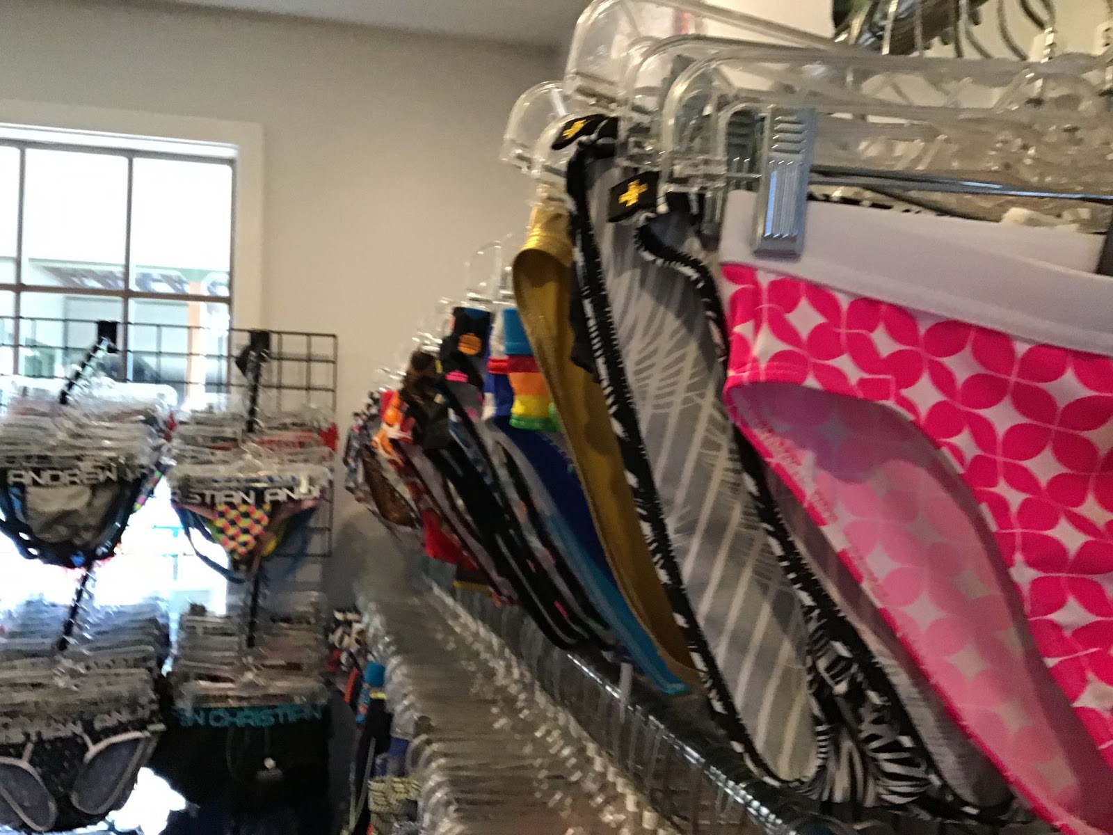 a series of speedos and gay male swimwear in the swimwear shop on location at the dunes resort in michigan USA