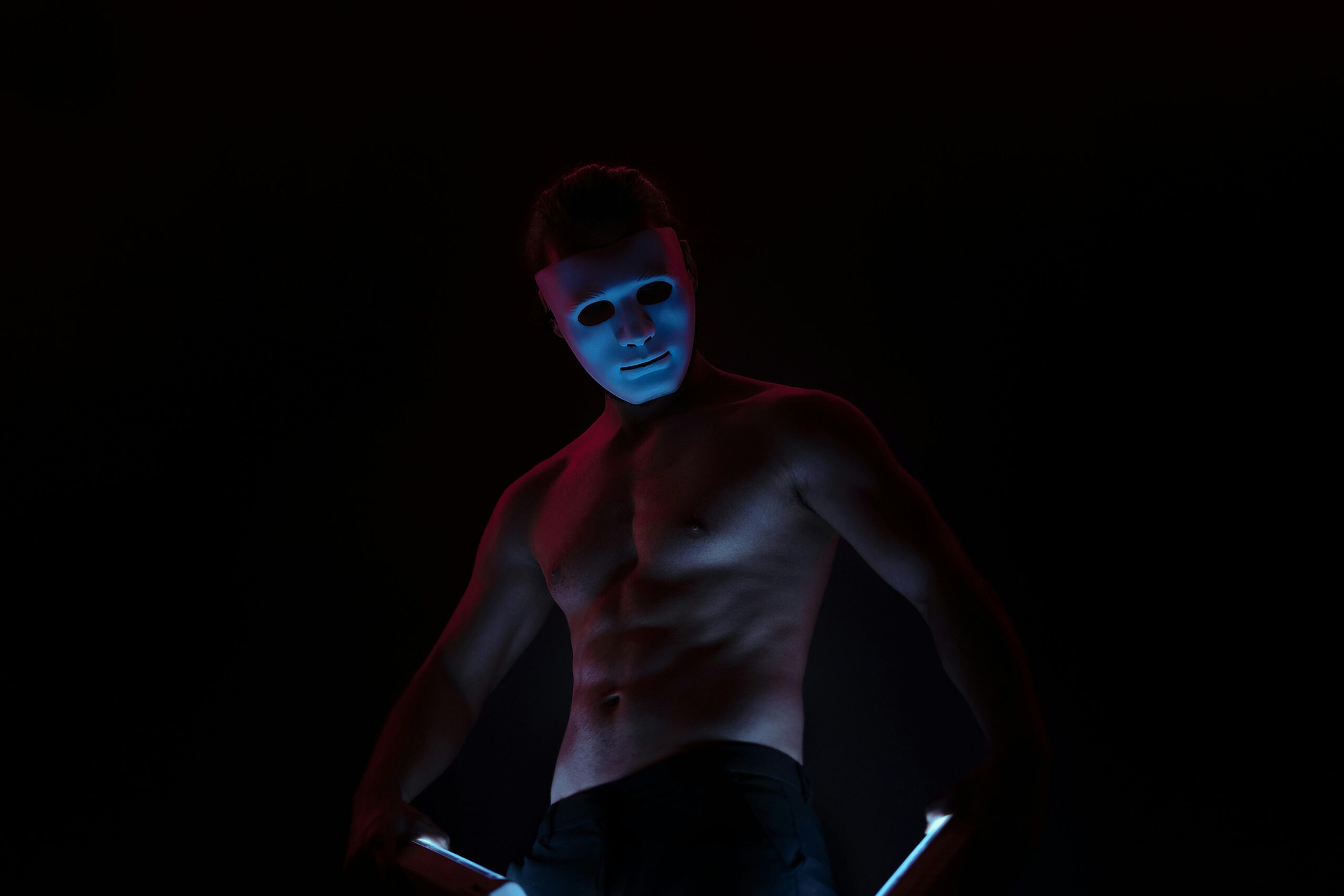 gay shirtless male wearing a mask to hide his face during gay anonymous bareback sex copyright via pexel creator mcray