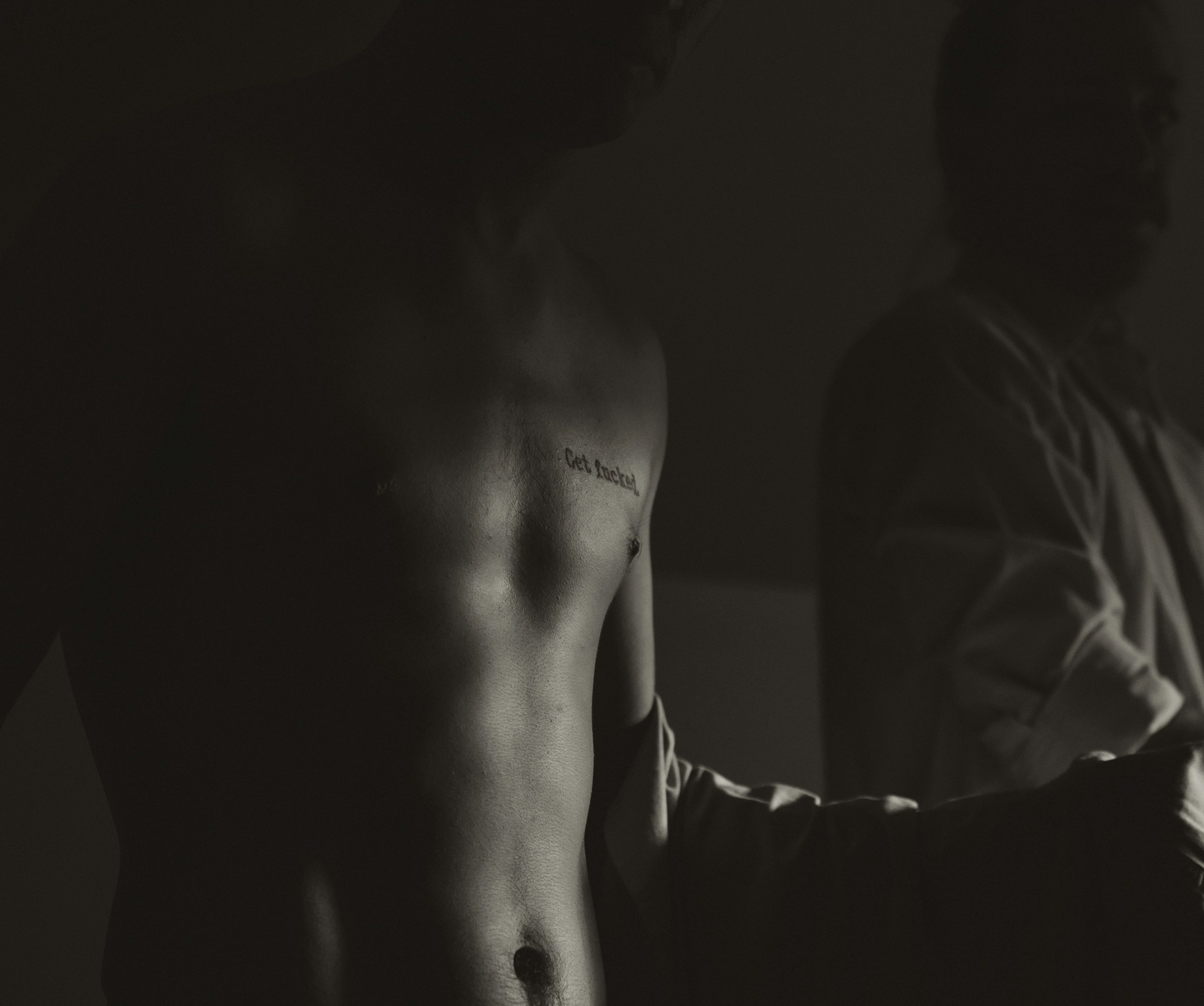 shirtless male in gay bathhouse in sacramento california sac buddies ready for bareback sex Photo by Colton Sturgeon via Unsplash