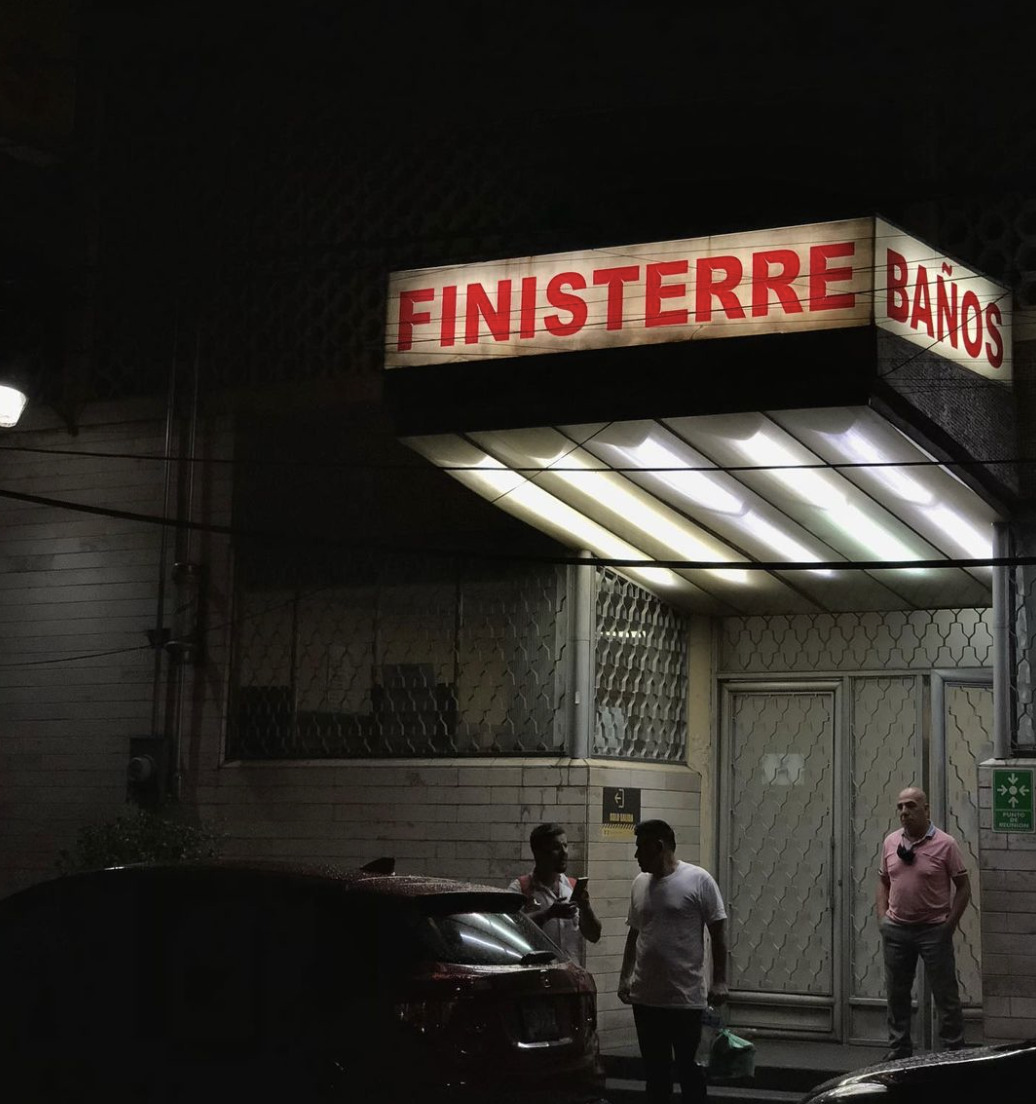 exterior photo of Banos Finisterre a mexico city bathhouse with patrons standing outside