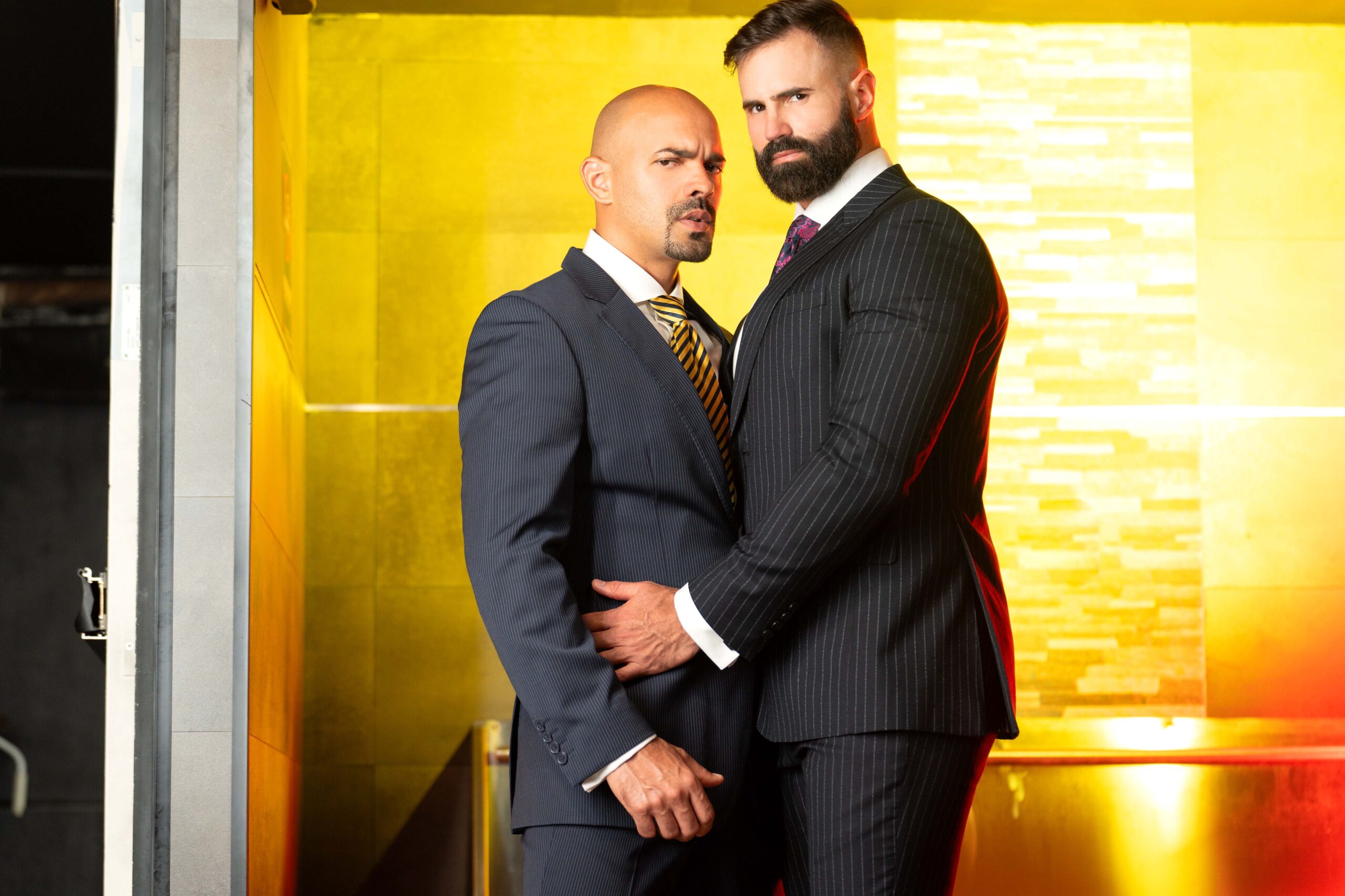 Studs in suits cruising for cock