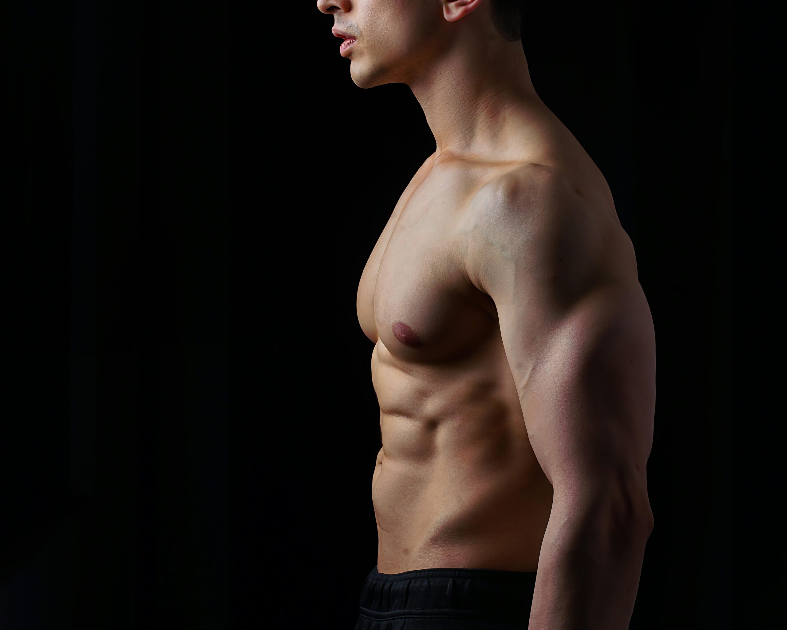 gay male shirtless ready for anonymous gay sex with males on Squirt photo via Photo by upender photography profile of a muscular man via Pexels