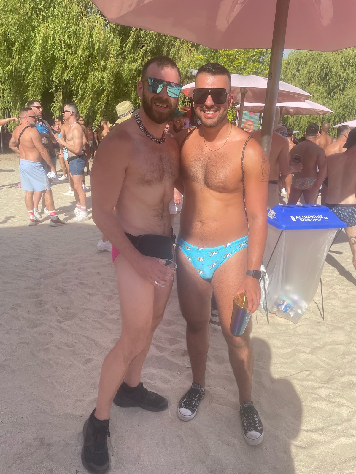 two hairy muscle studs at sugar beach toronto pride 2023